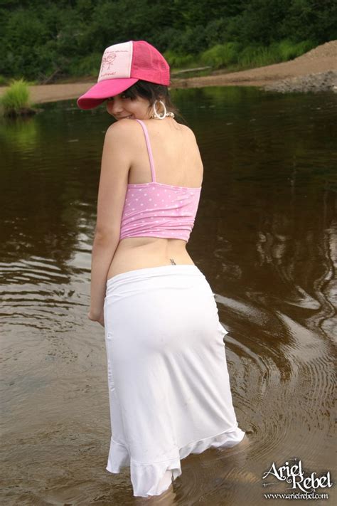 Ariel Rebel Posing In Her Cute Pink Shirt And White Skirt