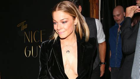 leann rimes kicks off birthday celebrations with sexy cleavage baring look