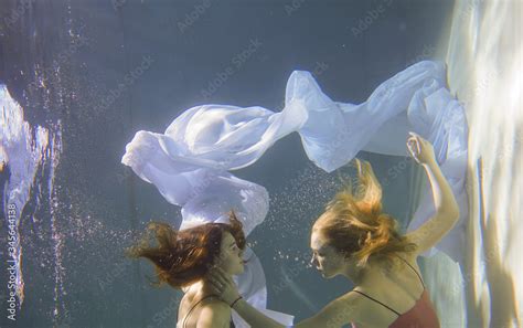Two Beautiful Lesbian Girls Are Swimming Underwater Attractiveness