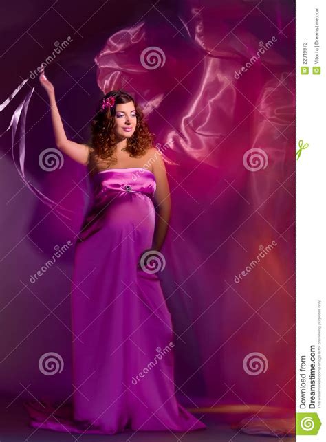 pregnant woman in pink and violet dress 1 stock image image of loving airy 22919973
