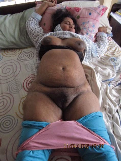 old desi indian aunty sleeping on bed