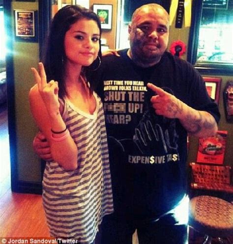 selena gomez flashes a cheeky new tattoo on right hip as she strips