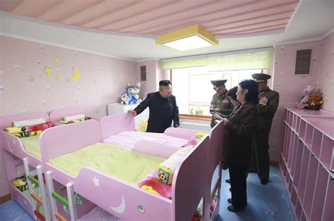 Kim Jong Un Closely Inspects Hello Kitty Set At Orphanage