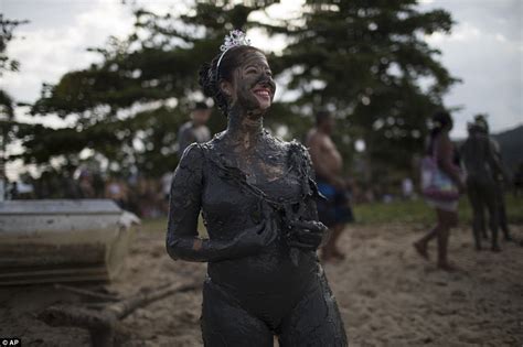 mud festival  brazil shows revellers covered  dirt daily mail