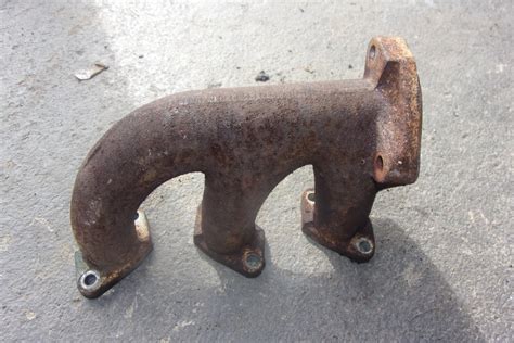 Kubota G6200 Exhaust Manifold