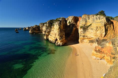 pristine beaches  dramatic shoreline  lagos portugal places