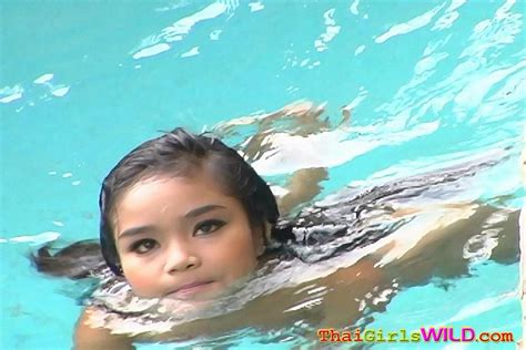 Tiny Thai Babe Panni Swimming Nude Outside At The Pool