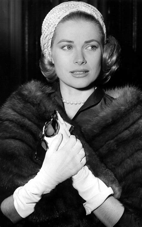 grace kelly in 1956 in her signature accessories a fur stole white