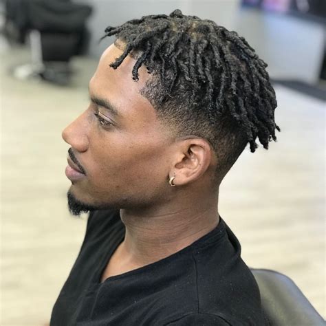 black man twist hairstyle wavy haircut