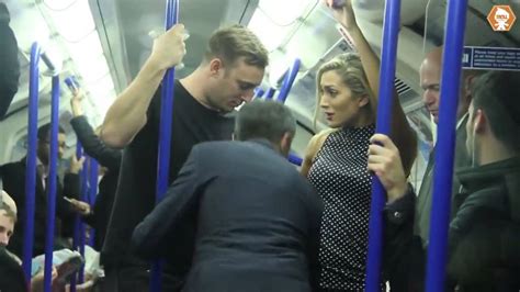 video shows men rushing to woman s aid in fake sex assault on london tube train youtube