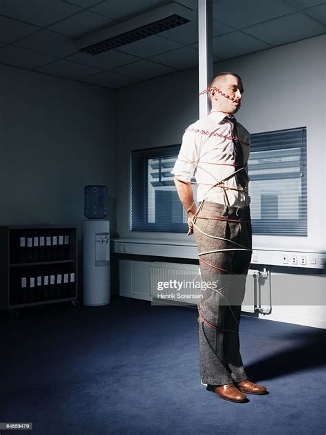 man tied up in his office photo getty images