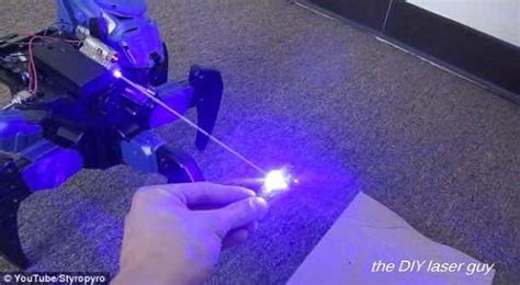 guy creates  death ray laser drone bot  home