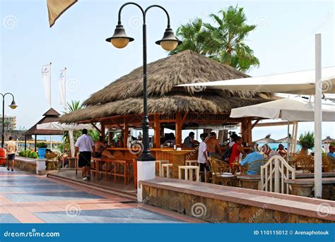 promenade beach bar torremolinos editorial photography image  tourist europe