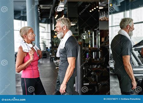 Affectionate Mature Couple During First Meeting In Gym Stock Image