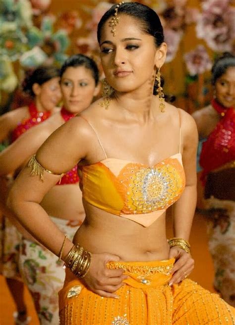 rudhramadevi ansuhka hot and sexy unseen navel in two piece yellow
