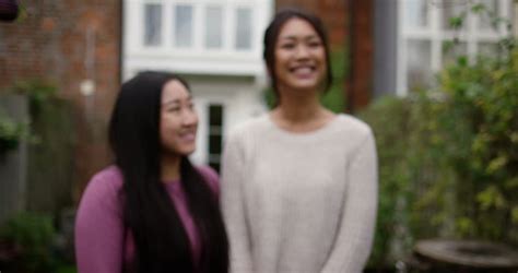 Asian Lesbian Couple Get A Key To Their New Home Shot On