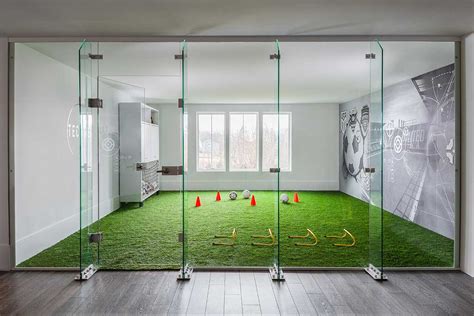 family brought  soccer field home   indoor training area
