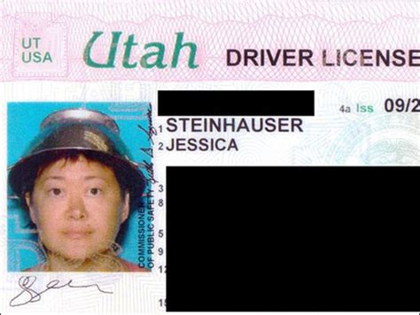 woman wears colander for driver s license photo