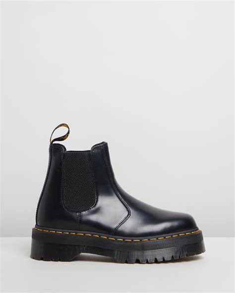 quad platform boots unisex black polished smooth  dr martens shoesales