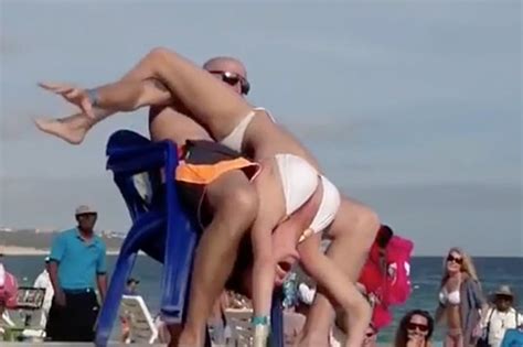 couple get into x rated sex position during erotic beach game daily star