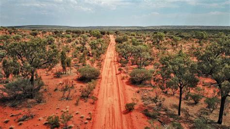 woman rescued after 12 nights stranded in australian outback 2 missing