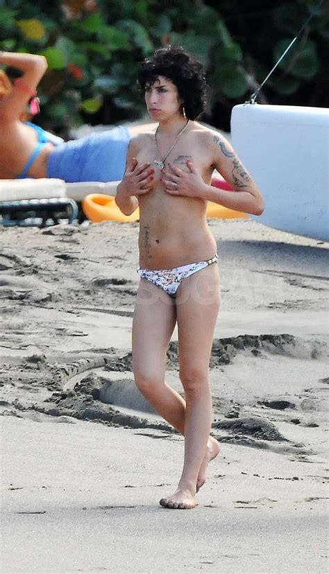 photos of amy winehouse topless and in bikinis in st