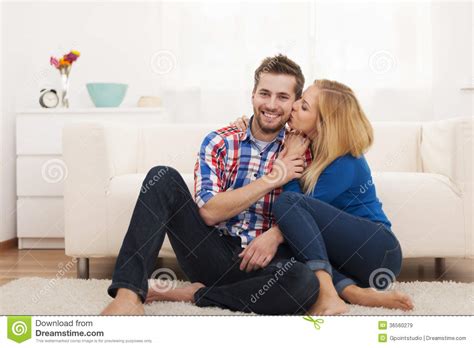 couple in living room stock image image of cross camera