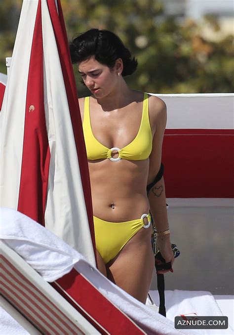 Dua Lipa Sexy In Yellow Bikini As She Takes Dip In The