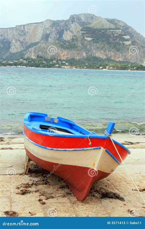 fishing boat   shore stock image image  scenic