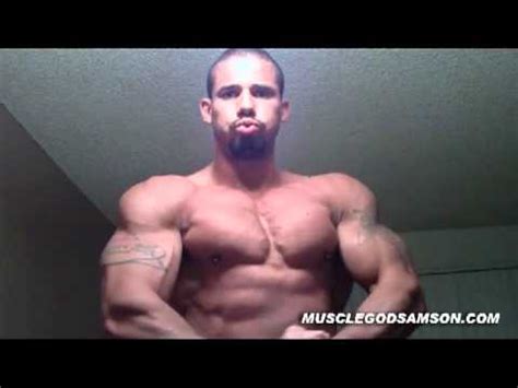 muscle god samson flexing  huge biceps flex bodybuilder