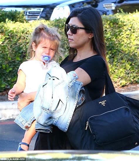 kourtney kardashian shows bump out with penelope and mason daily mail