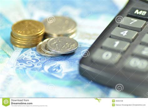 polish zloty banknotes coins  calculator stock photo image  finance coin