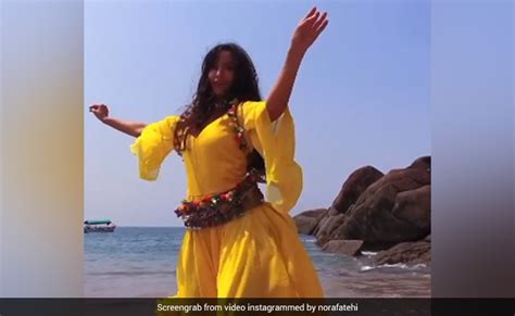nora fatehi belly dance on beach actress dance video winning heart on
