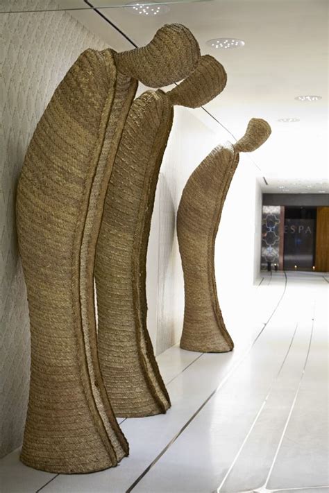Bowing Sculptures Line The Hallway At Yas Viceroy Abu Dhabi