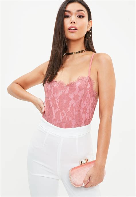 lyst missguided pink lace overlay bodysuit in pink