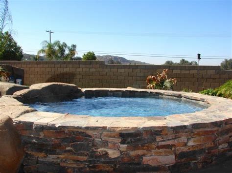 ground pool  stone surround pool tile