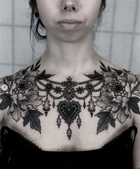 blackwork ornamental chest tattoo chest tattoos  women cool chest