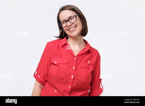Attractive Caucaisn Mature Woman In Glasses Smiling Looking At Camera
