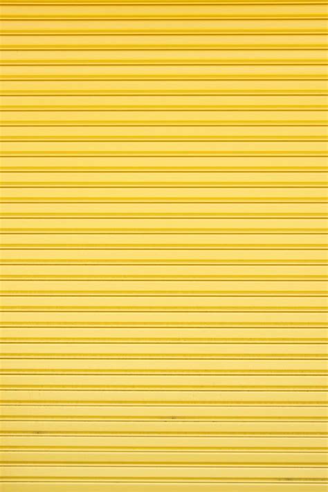 yellow wallpaper   yellow wallpaper photo unsplash