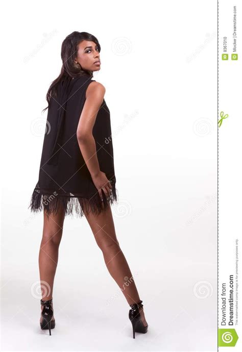 fashion model afro american woman in black dress stock