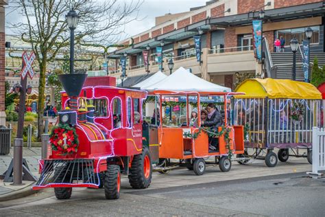 trackless train ride parking shuttle carnival holiday