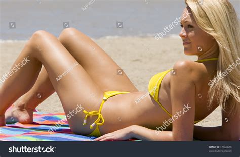 beautiful woman laying    beach stock photo  shutterstock