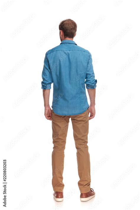 view   casual man standing stock photo adobe stock