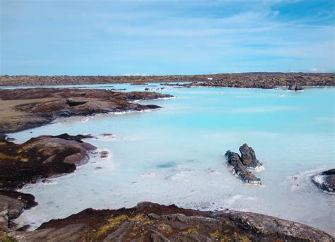 which to visit the blue lagoon or a local iceland pool