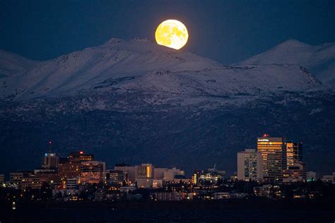 blue moon brightens anchorage sky   clear weekend