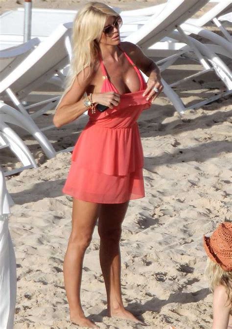 upskirt moment victoria silvstedt s take off her clothes into red bikini as she suns herself in