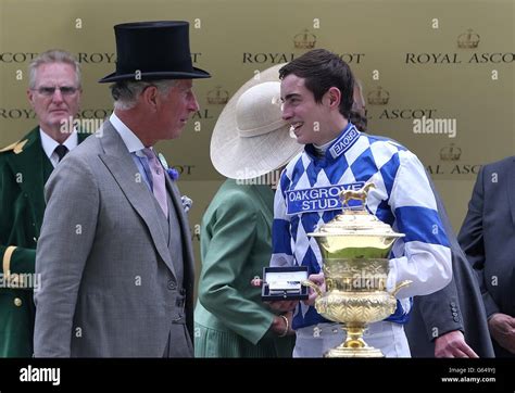 Prince Charles Presents The Trophy To Jockey James Doyle After Winning