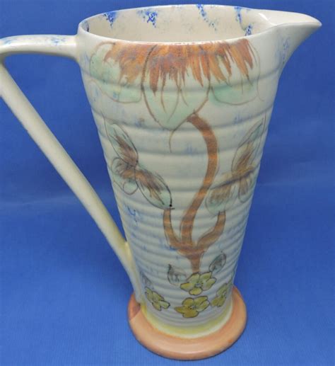 large english kensington ware pottery jug  hand painted floral designs