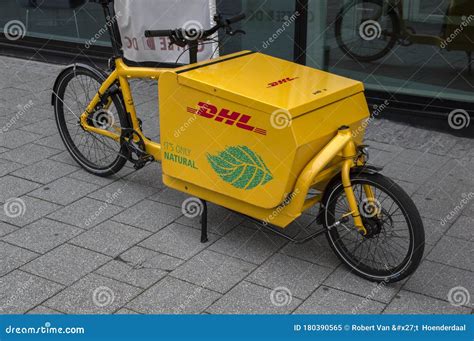 dhl electrical delivery bicycle  amsterdam  netherlands  editorial image image