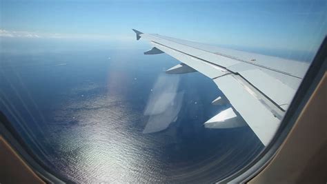 airplane flying  sea stock footage video  shutterstock